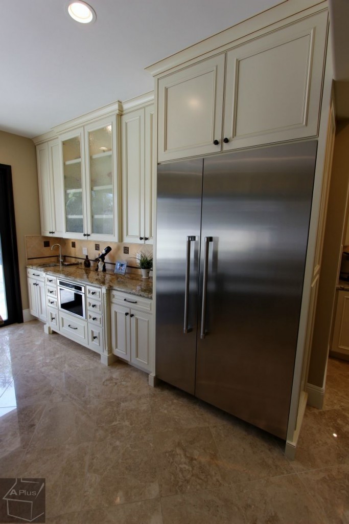traditional 2-section white & brown kitchen remodel with custom cabinets